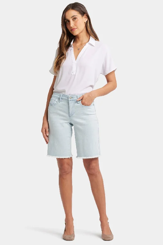 Cut-off shorts – Shorts made by cutting denim or other fabric, typically frayed at the edges for a distressed look.Lilly Boyfriend Denim Shorts - Glacier Frost