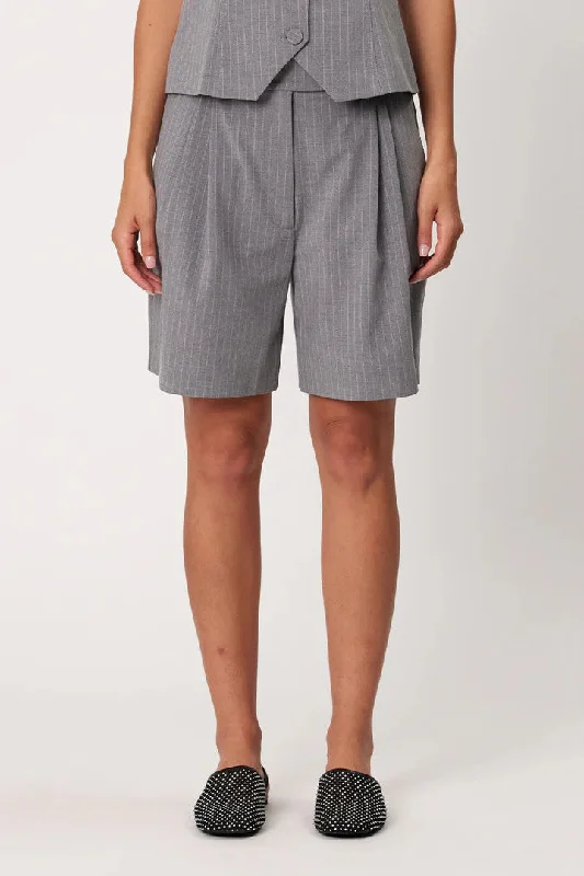 Culottes – Wide-legged, knee-length or mid-calf shorts that resemble a skirt but are more comfortable and practical.Remain - Hayden Shorts, Smoke Pinstripe