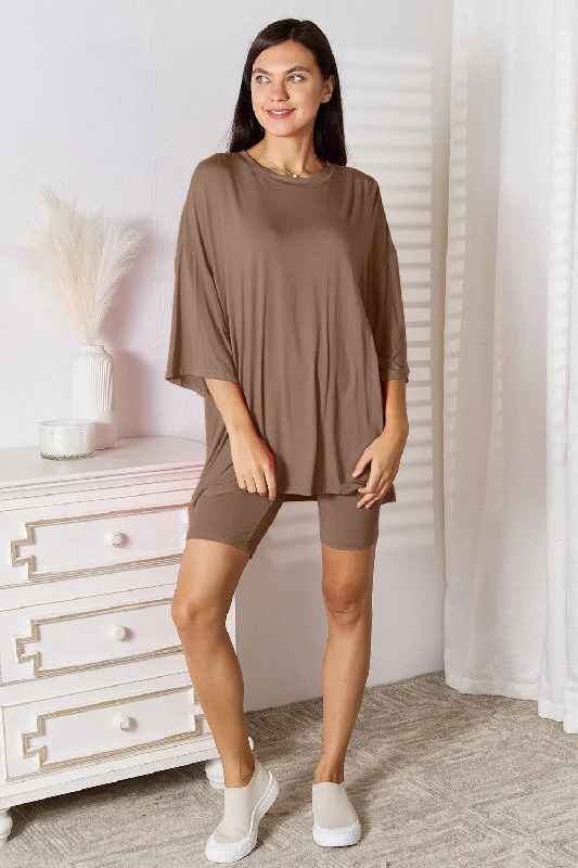 Athletic shorts – Shorts designed for sports or working out, often made from lightweight, moisture-wicking materials.Basic Bae Full Size Soft Rayon Three-Quarter Sleeve Top and Shorts Set