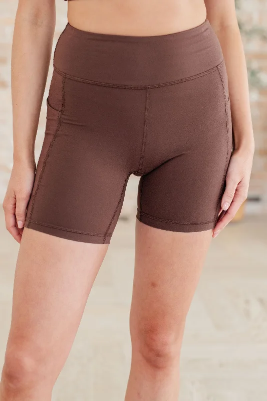 Button-front shorts – Shorts with a button-up closure at the front for a chic, stylish detail.Getting Active Biker Shorts in Java