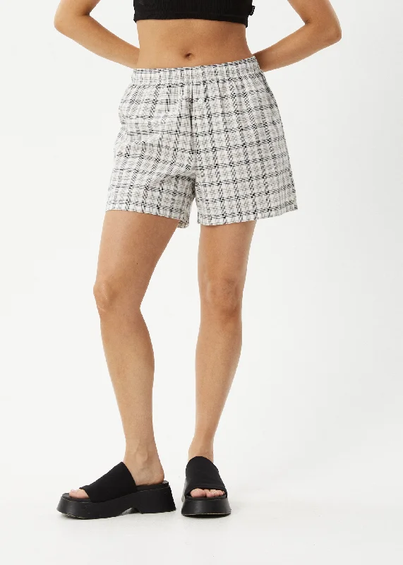 Linen shorts – Lightweight and breathable shorts made from linen, ideal for hot weather.AFENDS Womens Leo - Seersucker Boxer Shorts - Black / White