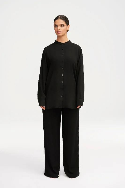 Bootcut trousers – Slightly flared at the bottom, designed to accommodate boots underneath.Alina Wide Leg Pants - Black