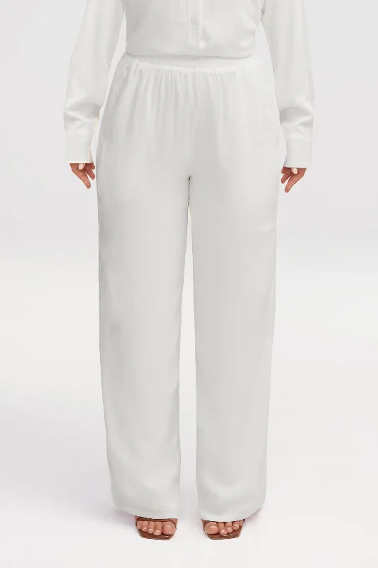 Booty-lifting trousers – Trousers designed with specific stitching or structure to enhance the shape of the rear.Alina Wide Leg Pants - White