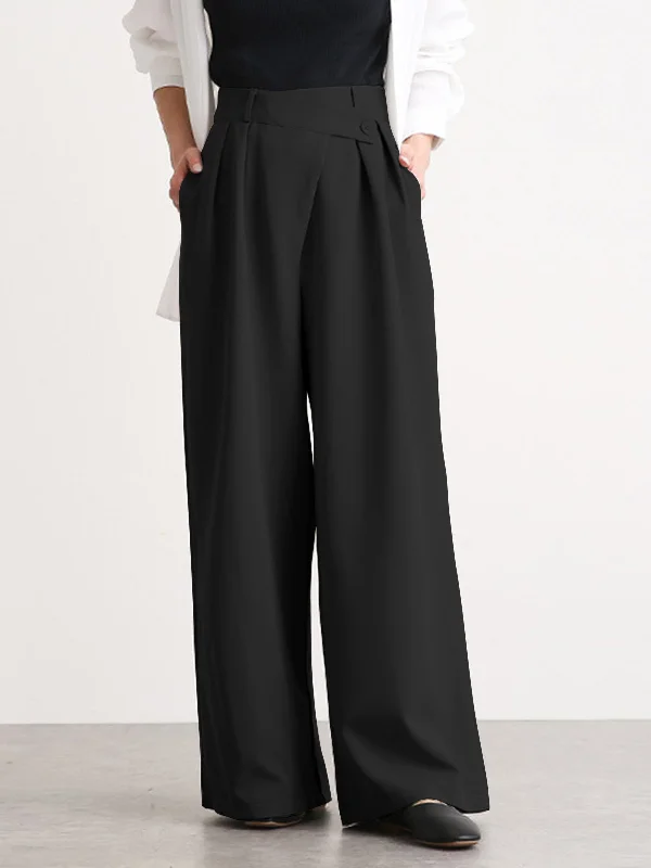 Athleisure trousers – Comfortable, performance-focused trousers that can be worn for both working out and casual wear.BerryBetty - Asymmetric Buttoned Wide Leg Dress Pants