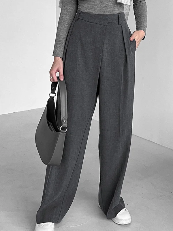 Linen trousers – Lightweight, breathable trousers made from linen fabric, perfect for warmer weather.BerryBetty - Asymmetric Buttoned Wide Leg Pants