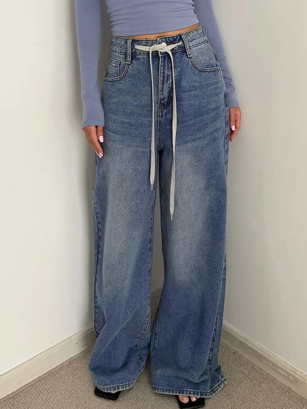 Wide-waistband trousers – Trousers with a thick waistband, often providing a more structured or comfortable fit.BerryBetty - Buttoned Tied Denim Boyfriend Jeans