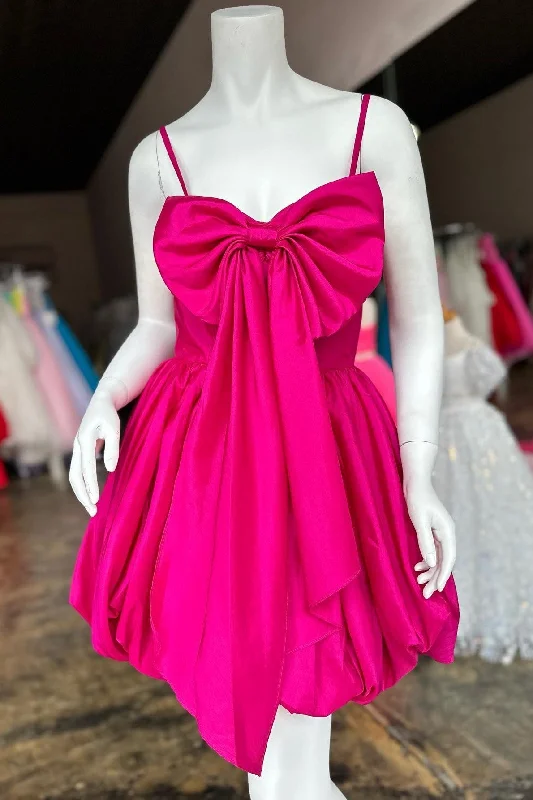 Boho dress – Dress with a relaxed, bohemian style, often featuring flowing fabric, ethnic prints, or vintage details.Cute A-Line Fuchsia Bow Bust Short Homecoming Dress