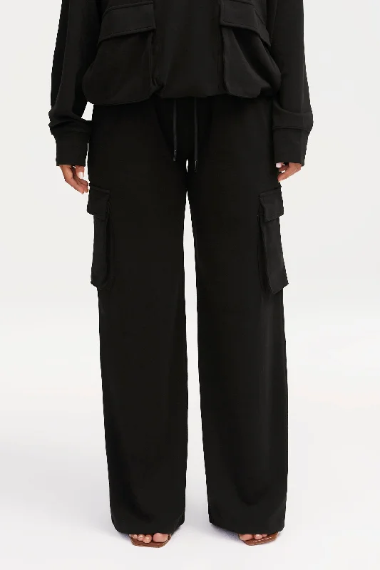 Pleated trousers – Trousers with folds or pleats in the front, often adding volume or texture to the garment.Demi Wide Leg Cargo Pocket Pants - Black