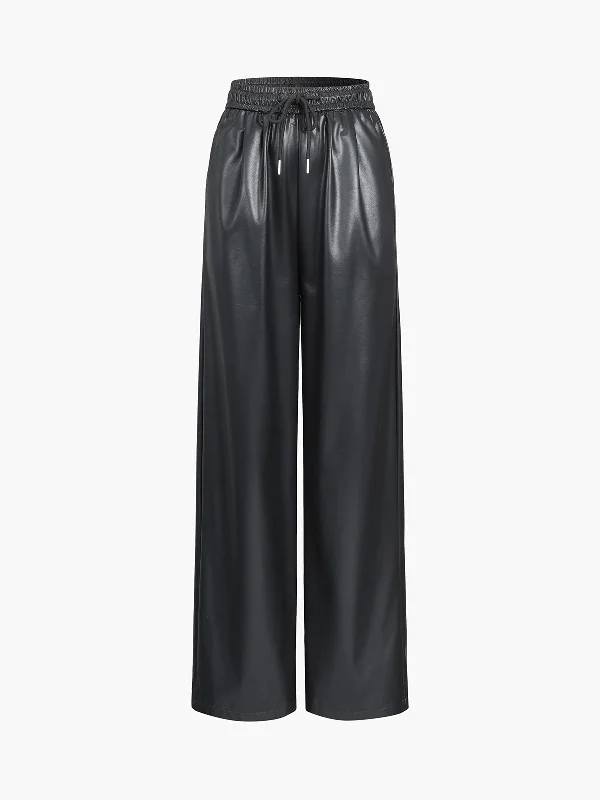 Pleated trousers – Trousers with folds or pleats in the front, often adding volume or texture to the garment.BerryBetty - Drawstring Faux Leather Straight Leg Pants