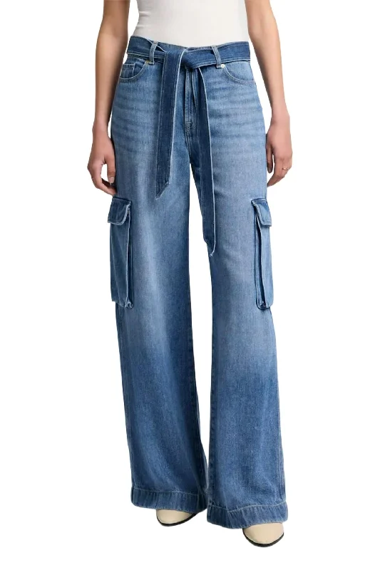 Flared trousers – Trousers with a gradual flare from the knee down, often associated with retro or 1970s fashion.Dream Cargo Palazzo Denim Jeans In Mid Blue