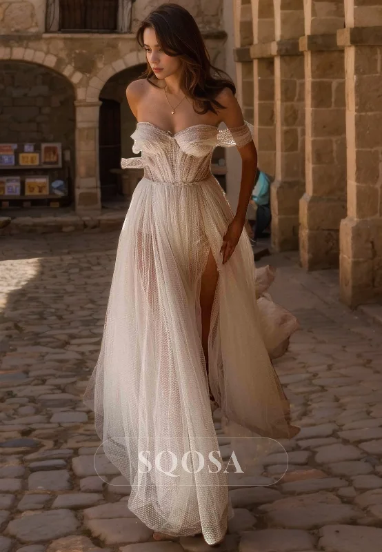 Off-the-shoulder dress – Dress with sleeves or straps that sit below the shoulders, exposing the upper arms.A Line Sweetheart Tulle Boho Wedding Dress with Train Bridal Gown