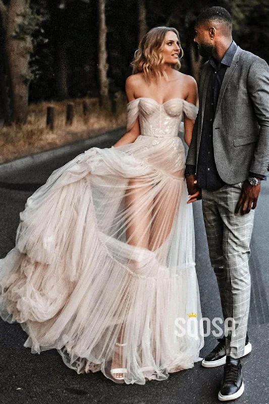 V-neck dress – Dress with a V-shaped neckline that flatters the chest and elongates the neck.Unique Off-Shoulder Tulle Pleats Bohemian Wedding Dress QW2421