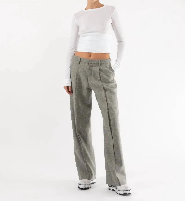 Cropped trousers – Trousers that are shortened to a length above the ankle.Exposed Seam Trousers In Light Heather Grey