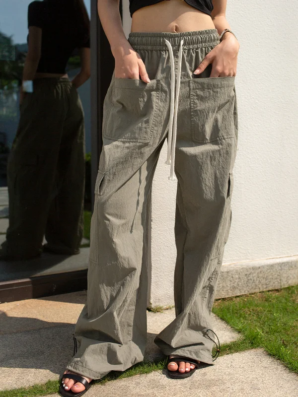 Cargo trousers – Loose-fitting trousers with large pockets on the sides, often made from durable materials.BerryBetty - First Take Parachute Pants