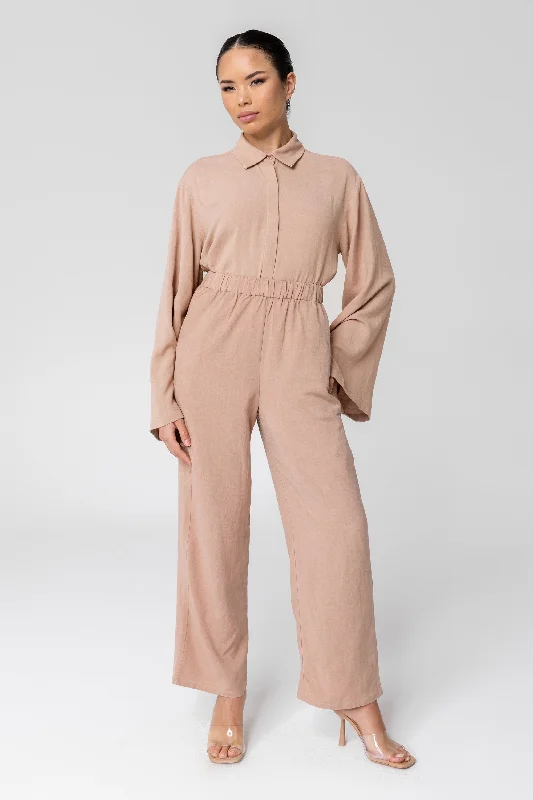 Button-front trousers – Trousers that feature a row of buttons along the waistband for a stylish detail.Gemma Linen Wide Leg Pants - Natural