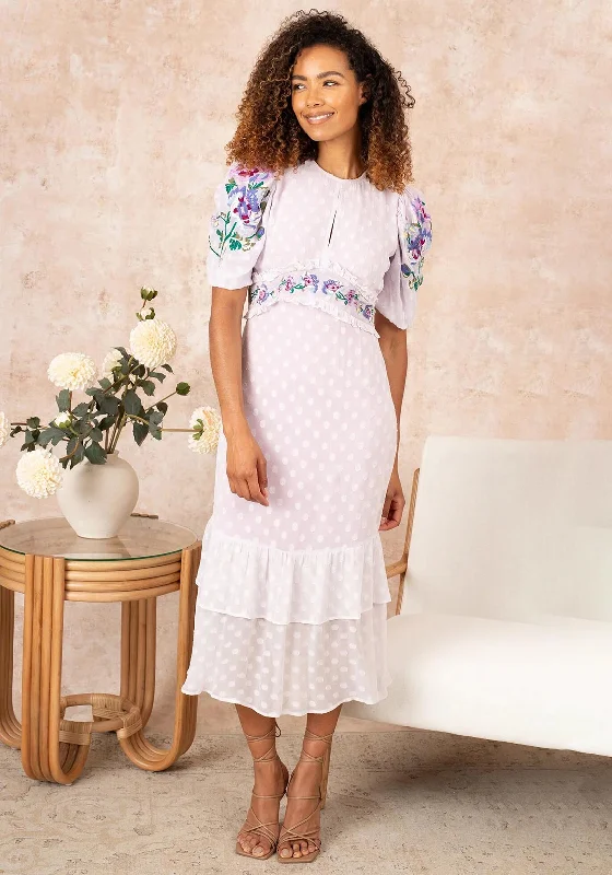 Peplum dress – Dress with a flared ruffle or extra fabric at the waist, adding volume and shaping to the lower half.Hope & Ivy Valencia Dobby Mesh Midi Dress, Lilac