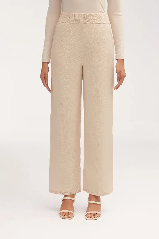 Paperbag waist trousers – Trousers with a gathered waistband, often cinched with a belt for added style.Jess Knit Wide Leg Pants - Beige