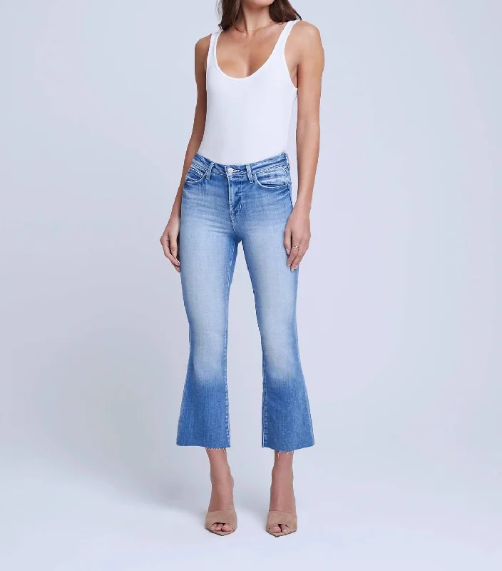 Pleated trousers – Trousers with folds or pleats in the front, often adding volume or texture to the garment.Kendra High-Rise Cropped Flare Jeans In Balboa