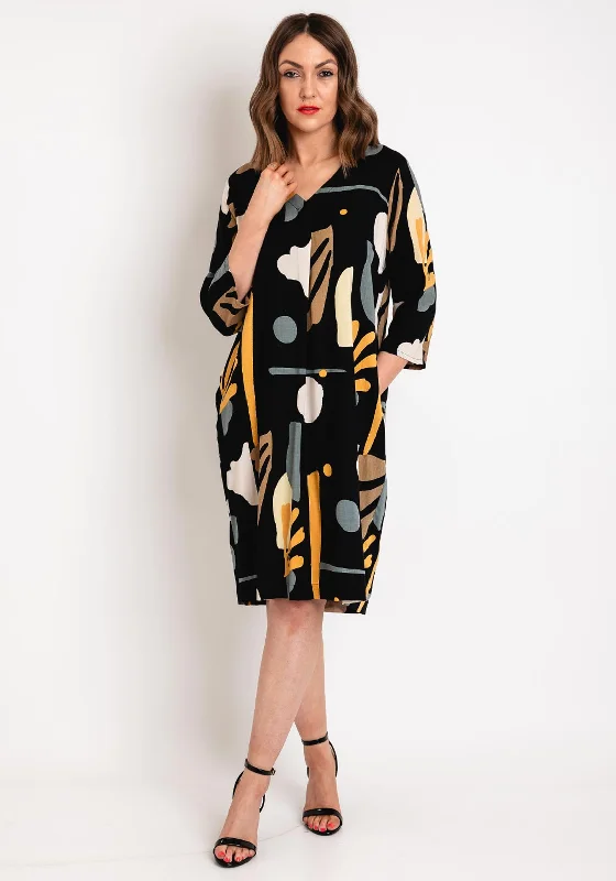 Off-the-shoulder dress – Dress with sleeves or straps that sit below the shoulders, exposing the upper arms.Masai Nodetta V-Neck Print Knee Length Dress, Butterscotch