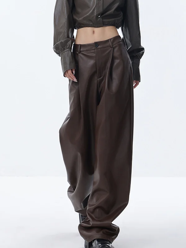 Palazzo trousers – Wide-leg trousers made from light, flowy fabric, often associated with a chic or bohemian look.BerryBetty - Meet You There Faux Leather Wide Leg Pants