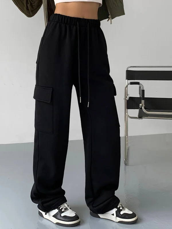 Paperbag waist trousers – Trousers with a gathered waistband, often cinched with a belt for added style.BerryBetty - On The Go Pockets Cargo Sweatpants