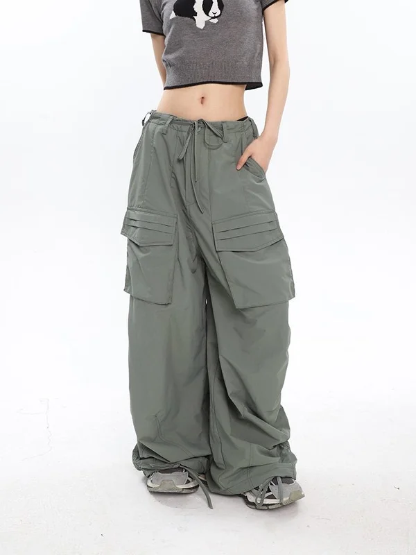 Denim trousers – Made from denim fabric, often resembling jeans but styled as more formal trousers.BerryBetty - Stay With You Cargo Parachute Pants