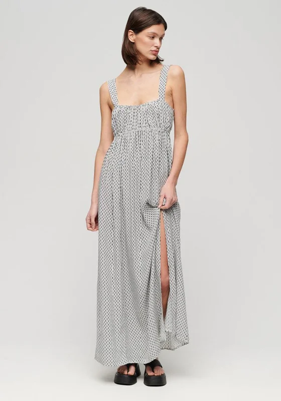 Tulle dress – Dress made with soft, voluminous tulle fabric, often worn for formal occasions or as part of a bridal outfit.Superdry Womens Tie Back Maxi Dress, Mono Cross Geo