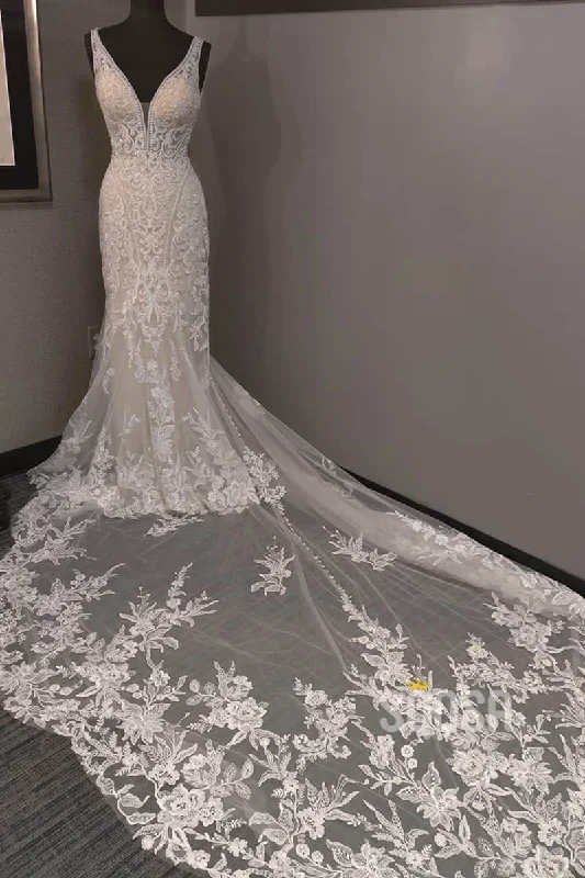 Halterneck dress – Dress with straps that tie around the neck, leaving the shoulders and back exposed.Unique V-neck Lace Appliques Beaded Mermaid/Trumpet Wedding Dress QW2173