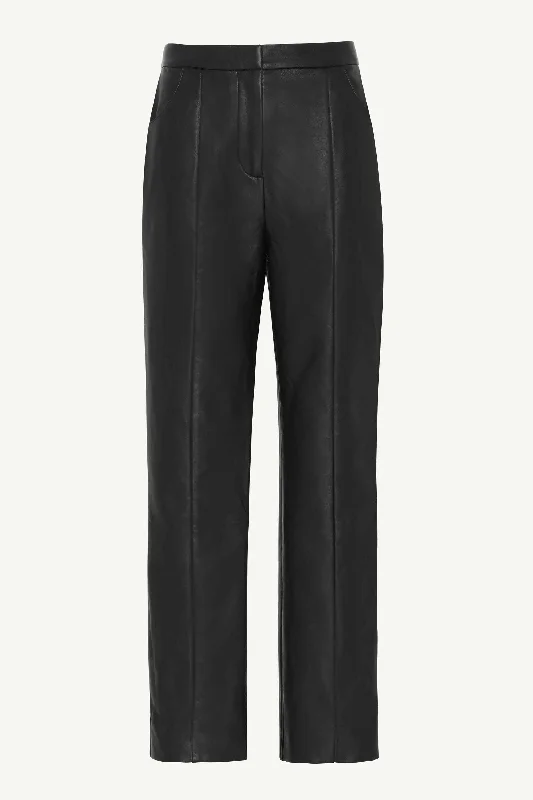 Tapered trousers – Trousers that narrow toward the ankle, creating a more fitted, streamlined look.Vegan Leather Straight Leg Trousers - Black