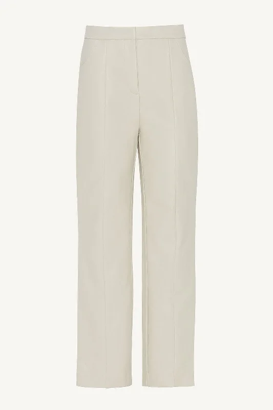 Paperbag waist trousers – Trousers with a gathered waistband, often cinched with a belt for added style.Vegan Leather Straight Leg Trousers - Soft Beige