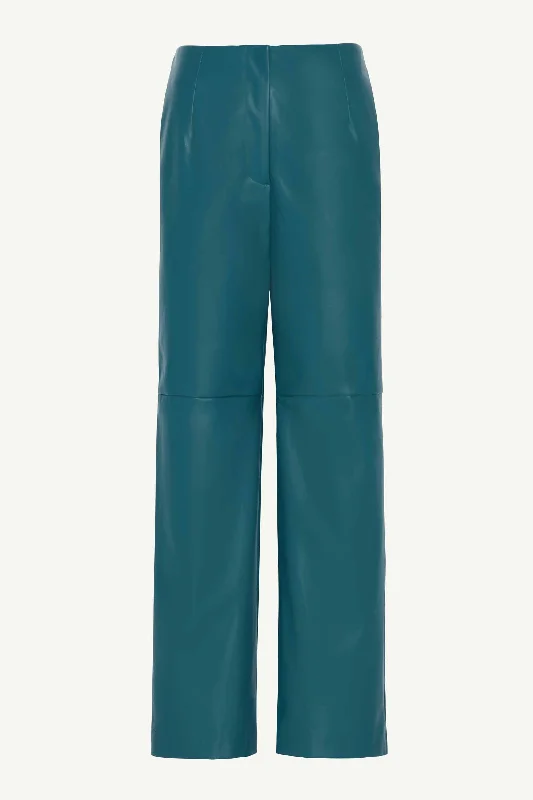 Stretch trousers – Trousers made with a small amount of spandex or elastane for added stretch and flexibility.Vegan Leather Wide Leg Trousers - Deep Teal