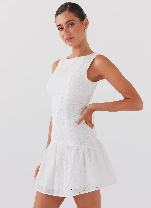 Wrap skirt – Skirt that wraps around the waist and is usually tied at one side.Adyson Broderie Mini Dress - White