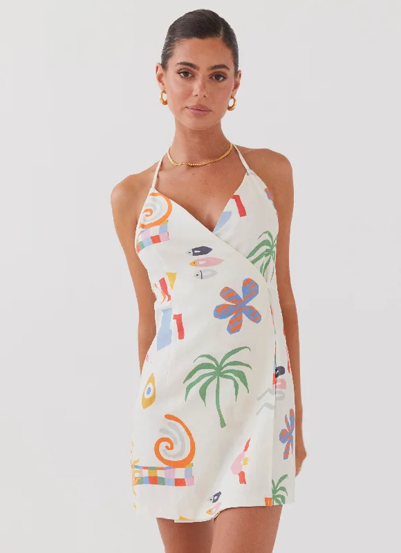 Wrap skirt – Skirt that wraps around the waist and is usually tied at one side.At Last Sunrise Wrap Linen Mini Dress - Summer Palm