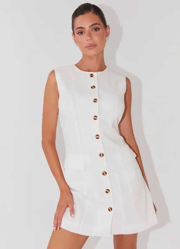 Tweed skirt – Skirt made from tweed fabric, often associated with a more classic or sophisticated look.Castello Fiore Linen Mini Dress - White