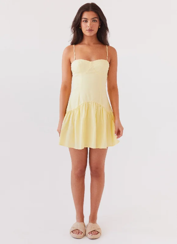 Ruffle skirt – Skirt with ruffled edges or layers, adding movement and texture.Endless Summer Mini Dress - Canary