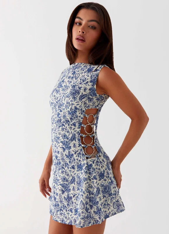 Slip skirt – A silky or satin skirt that mimics a slip dress, often worn for a smooth, elegant look.Indigo Bloom Linen Mini Dress - Blue Paisley