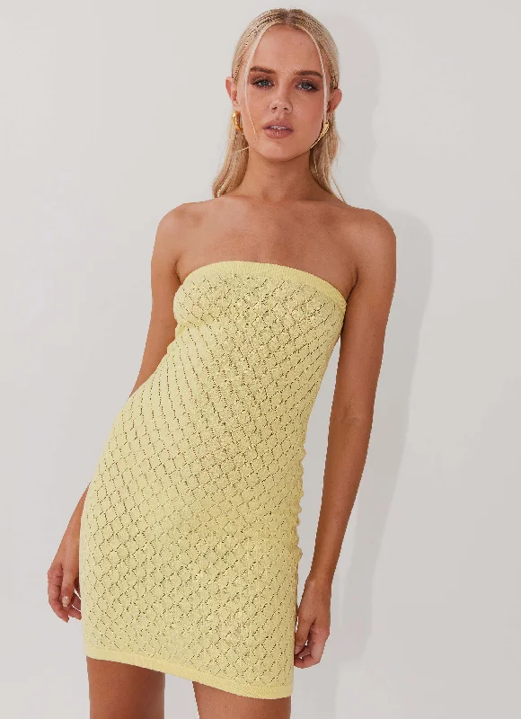 Skater skirt – Flared skirt that is fitted at the waist and flares out, resembling the shape of a skating skirt.Lifeline Knit Tube Mini Dress - Lemon