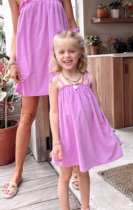 Asymmetrical skirt – Skirt with an uneven or diagonal hemline for a modern and unique appearance.Little Angel Mini ~ Purple Pink Terry