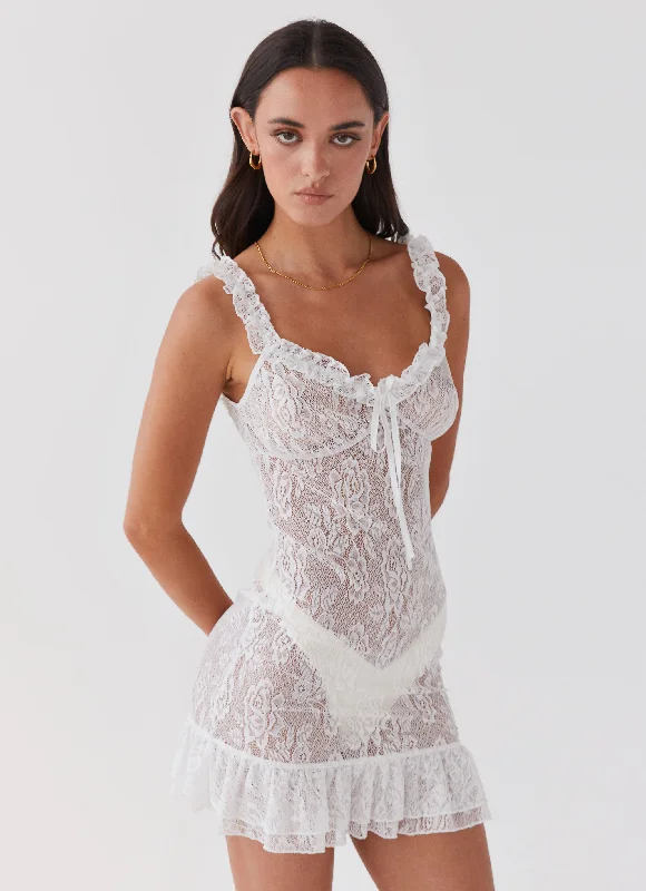 Slip skirt – A silky or satin skirt that mimics a slip dress, often worn for a smooth, elegant look.Love Lies Lace Mini Dress - Snow