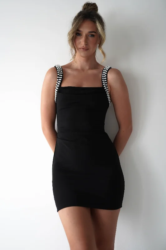 Skater skirt – Flared skirt that is fitted at the waist and flares out, resembling the shape of a skating skirt.Pia Pearl Detail Mini Dress | Black