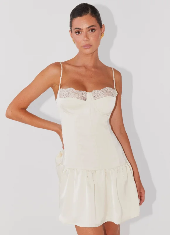 Maxi skirt – Skirt that reaches the ankles or floor, offering a long, flowing silhouette.Take A Chance Bustier Mini Dress - Ivory