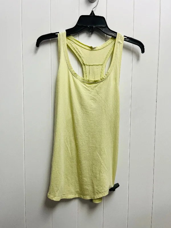 Peplum vest – Vest with a flared, ruffled bottom for a feminine silhouetteYellow Athletic Tank Top Lululemon, Size 4