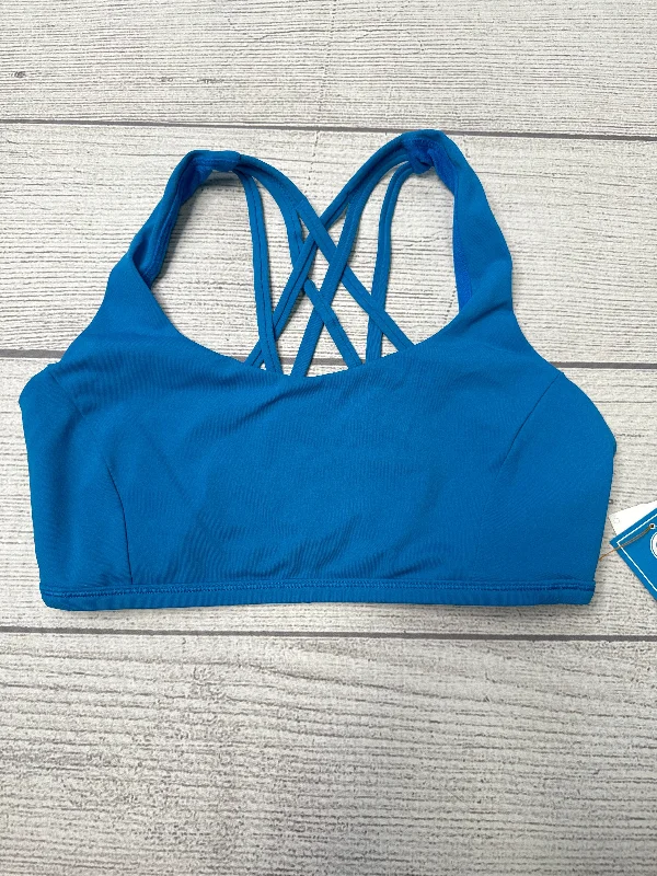 Racerback sports bra – Sports bra with a back design that features straps that meet in a "V" or "Y" shape, offering better shoulder mobility.Athletic Bra By Lululemon In Blue, Size: M