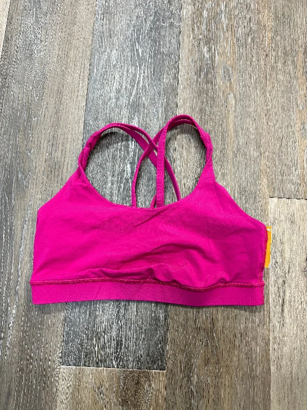 Compression sports bra – Sports bra that compresses the chest for a more secure fit and reduced bounce during high-impact activities.Athletic Bra By Lululemon In Pink, Size: 8