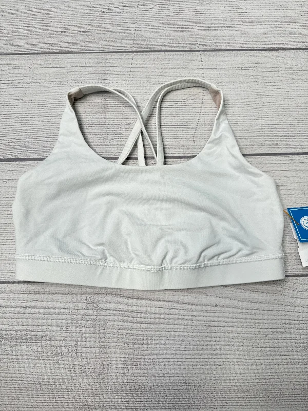 Compression tank sports bra – Combination of a tank top and sports bra, providing full coverage and support for the upper body.Athletic Bra By Lululemon In White, Size: M