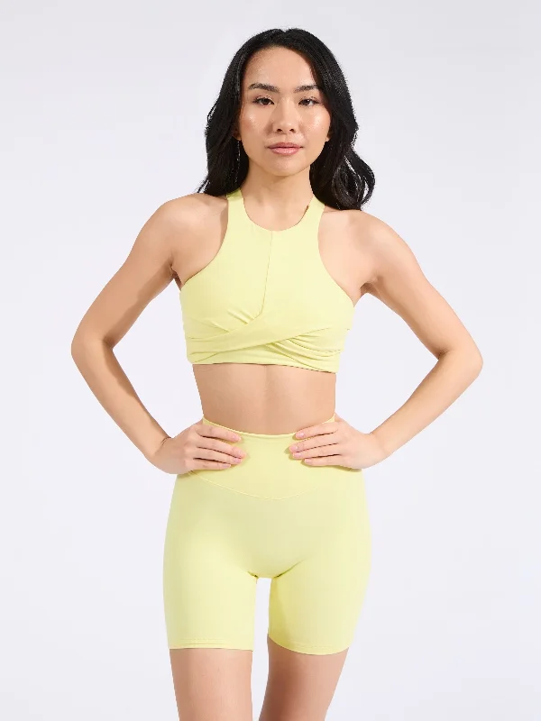 Criss-cross strap sports bra – Sports bra with straps that cross over at the back, providing extra support and a stylish look.Candy Crew Sports Bra - Afterglow Yellow