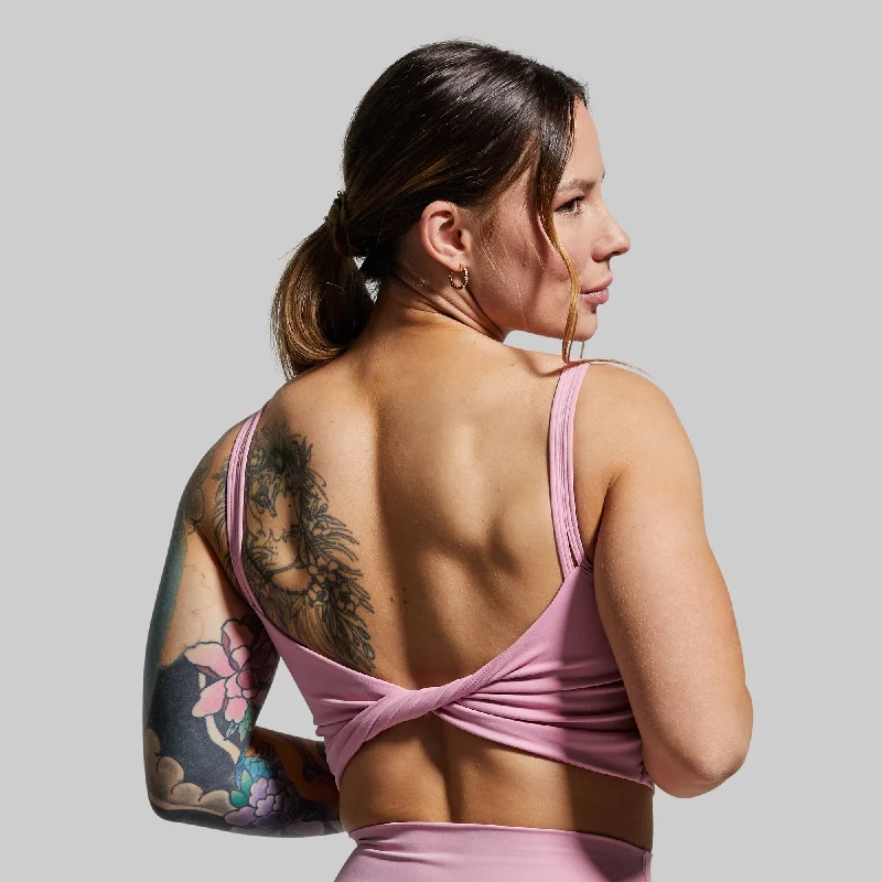 Compression sports bra – Sports bra that compresses the chest for a more secure fit and reduced bounce during high-impact activities.Don't Get It Twisted Sports Bra (Mystic Pink)