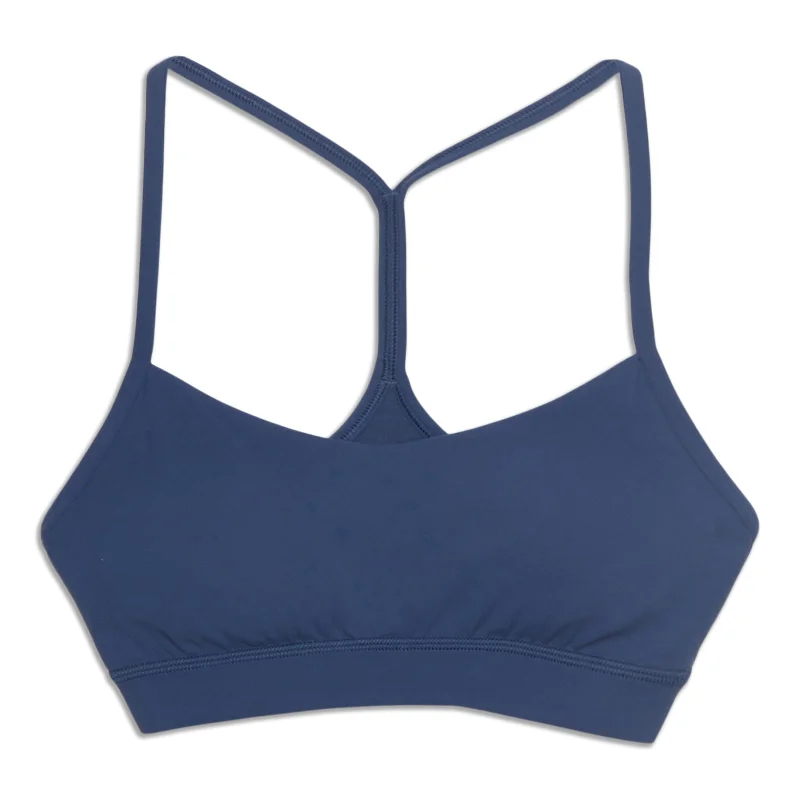 Push-up sports bra – Sports bra with added padding or structure to lift and shape the bust, providing extra support.Flow Y Bra - Resale