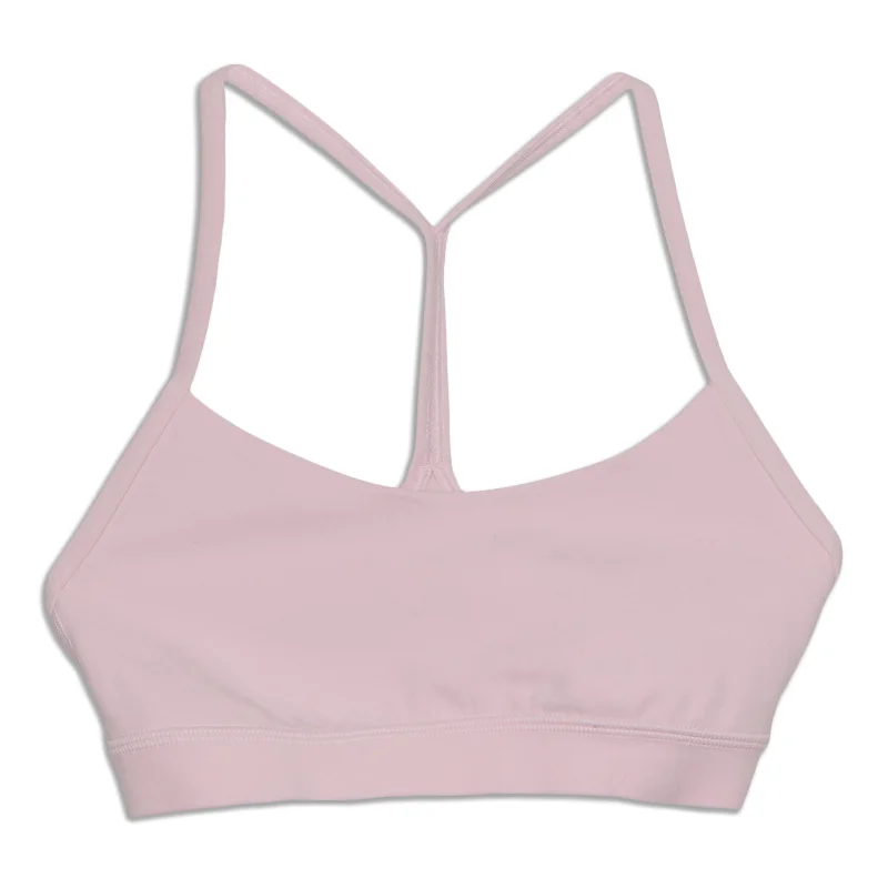 Wireless sports bra – Sports bra without underwire, offering more comfort and flexibility for a wide range of activities.Flow Y Bra - Resale