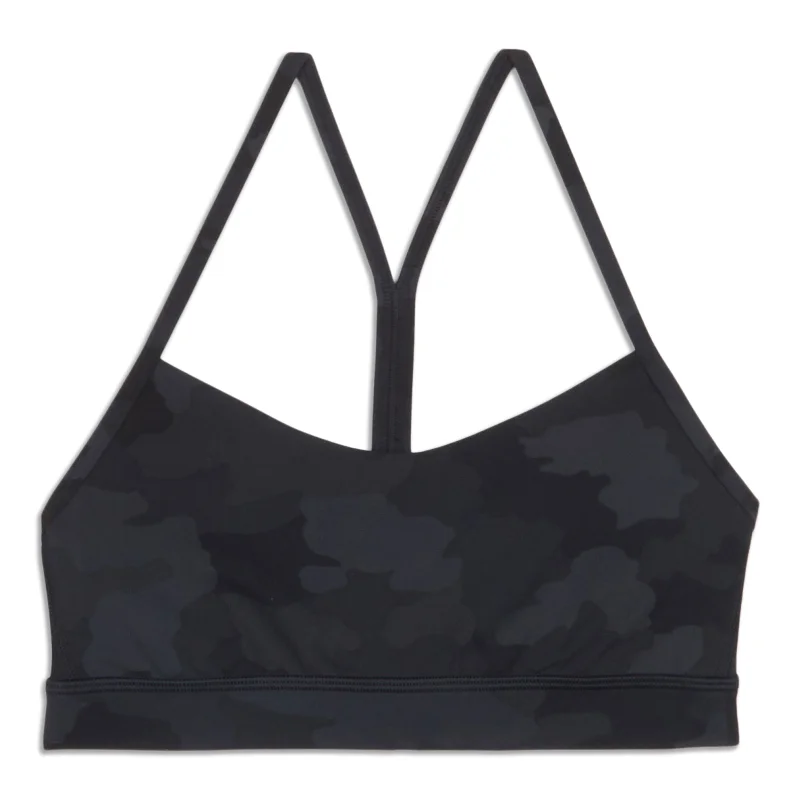 Push-up sports bra – Sports bra with added padding or structure to lift and shape the bust, providing extra support.Flow Y Bra - Resale